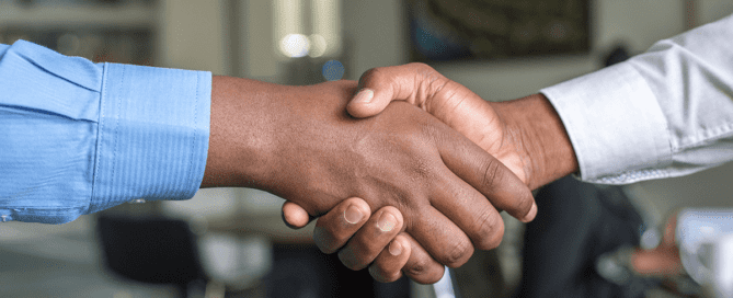 Two people shaking hands